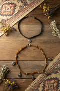 Add a touch of rustic, western flair to your jewelry collection with this beautifully handcrafted 2-Piece Leather Choker Necklace Set, built with durable, hypoallergenic stainless steel findings and spacers.