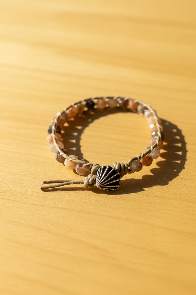 Handmade Black Sunstone & Leather Ladder Stitch Bracelet with Shell Clasp