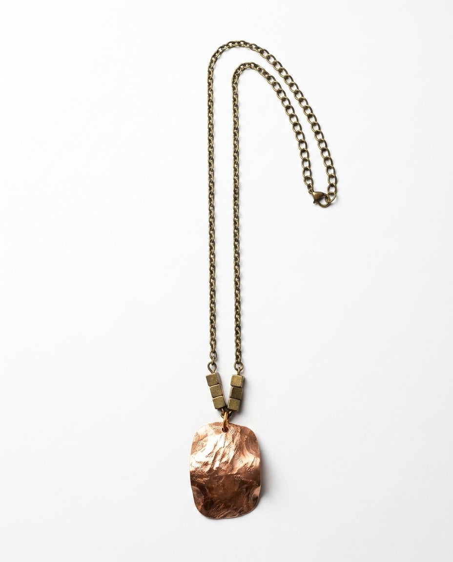 Artisan pendant necklace — Curated Flat Lay | Generated by Modelize
